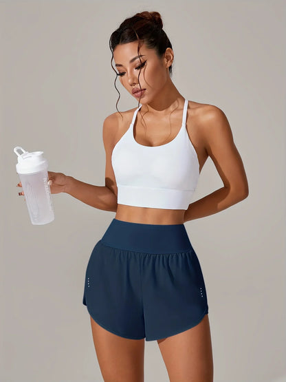 מכנסי יוגה לנשים – מכנסי ספורט קצרים עם חגורת מותן גבוהה ובד נושם בכל הצבעים - Kleerix בד נושם, גמיש, יוגה, לא שקוף, מותן גבוהה, מכנס, מתייבש מהר, ספורט, שורטס